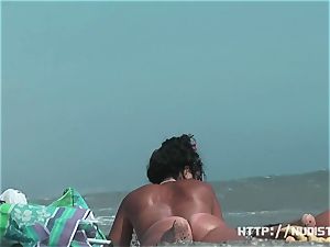 naturist beach flick presents superb looking nude honeys