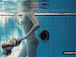torrid giant breasted nubile Lera swimming in the pool